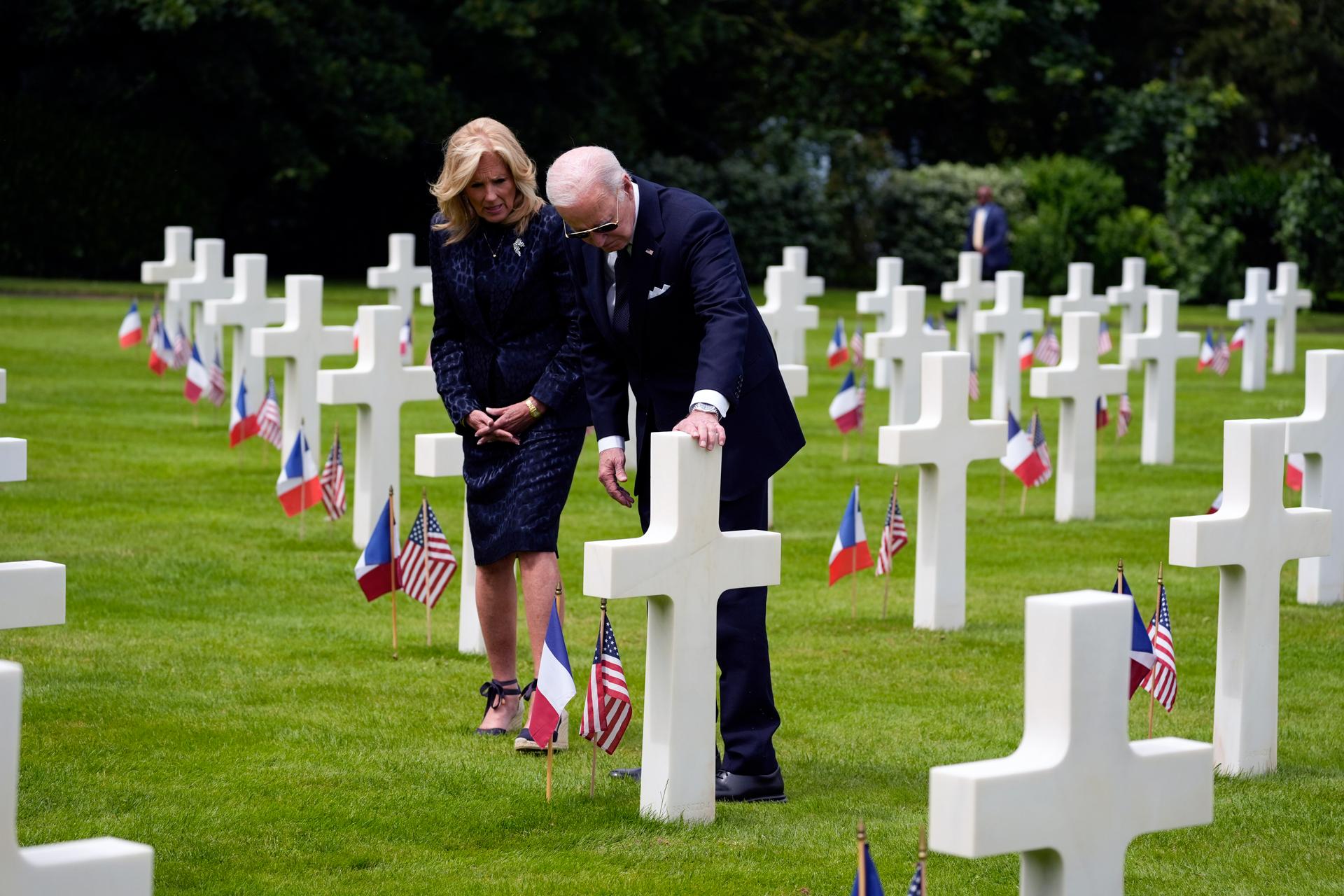 President Joe Biden and first lady Jill Biden, visit the graves at the Normandy American Cemetery on Thursday, June 6, 2024, in Normandy. 