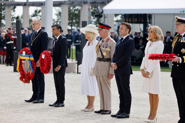 Britain's King Charles III, Britain's Queen Camilla, France's President Emmanuel Macron, French President's wife Brigitte Macron and Britain's Prime Minister Rishi Sunak attend the commemorative ceremony at the World War II British Normandy Memorial in Normandy, on June 6, 2024.  