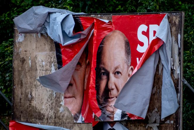 German Chancellor Scholz refuses early elections | WN24 1 A damaged election poster shows German Chancellor Olaf Scholz in Frankfurt, Germany, on June 10, 2024.