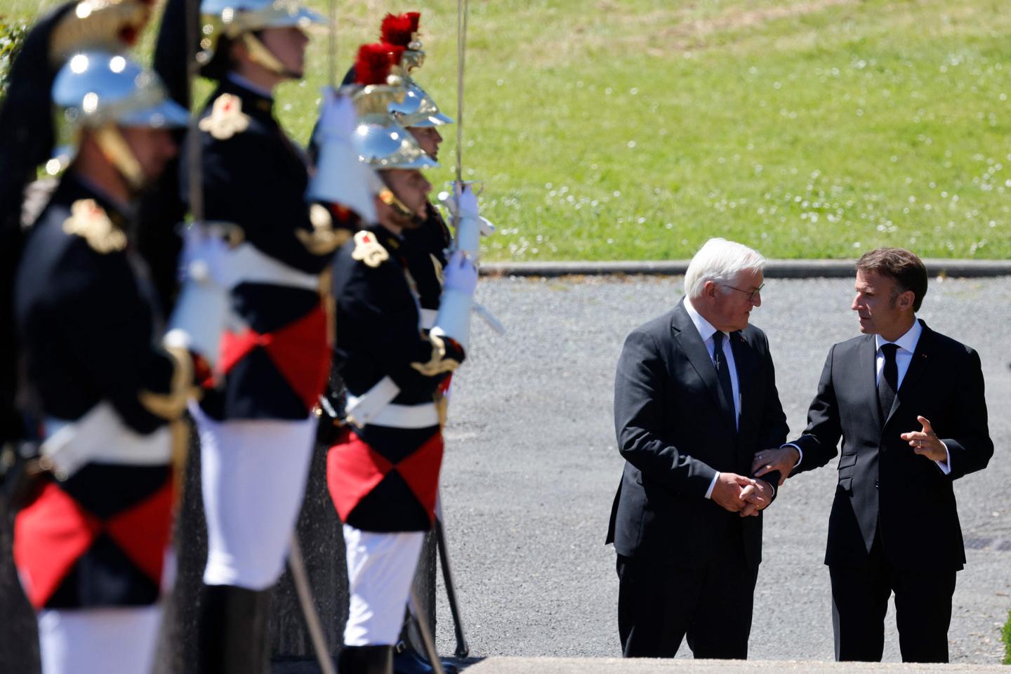 After calling snap elections, weakened Macron heads to series of international summits