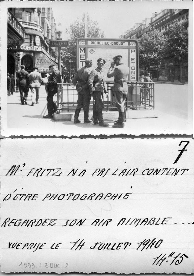 "Monsieur Fritz ne semble pas content d'être photographié. Regardez son air amical... Vue prise le 14 juillet 1940, 14h15."