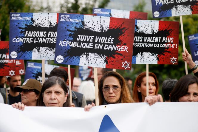 People attend a demonstration against anti-Semitism at the Place de la Bastille after three teenagers aged 12 to 13 were indicted in Courbevoie, accused of rape and anti-Semitic violence against a 12-year-old girl, in Paris, France, June 20, 2024. 