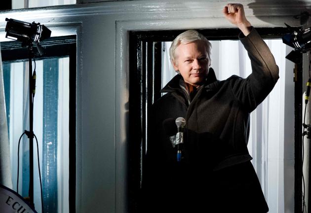Julian Assange during one of his appearances on the balcony of the Ecuadorian embassy in London, December 20, 2012.