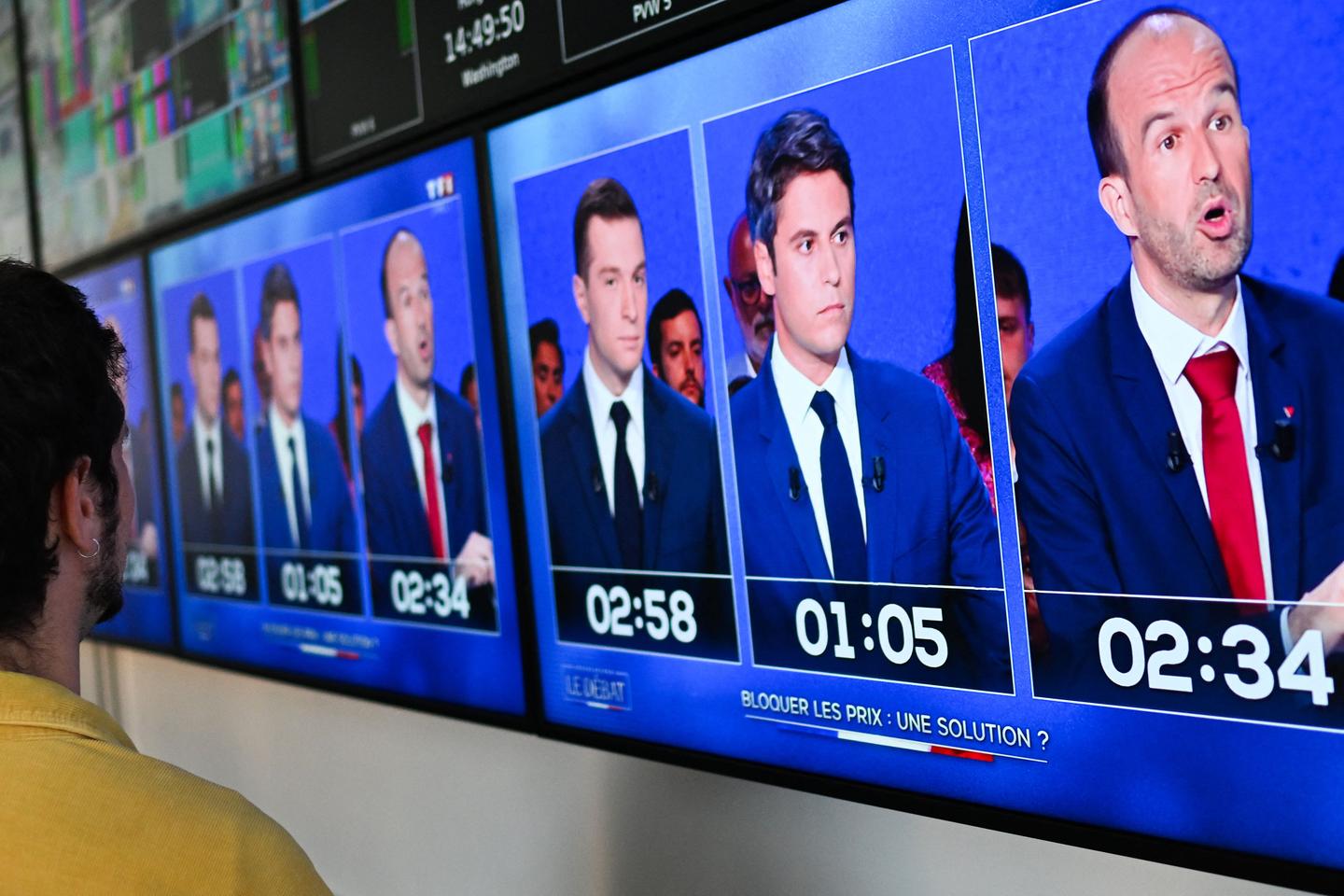 French PM and far-right chief clash in raucous election debate