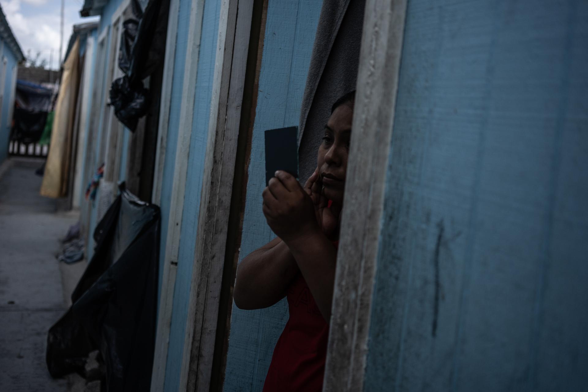 A migrant woman, at the Senda de vida 2 center, in Reynosa (state of Tamaulipas), on June 21, 2024. She has been waiting for her CBP One appointment for over four months.