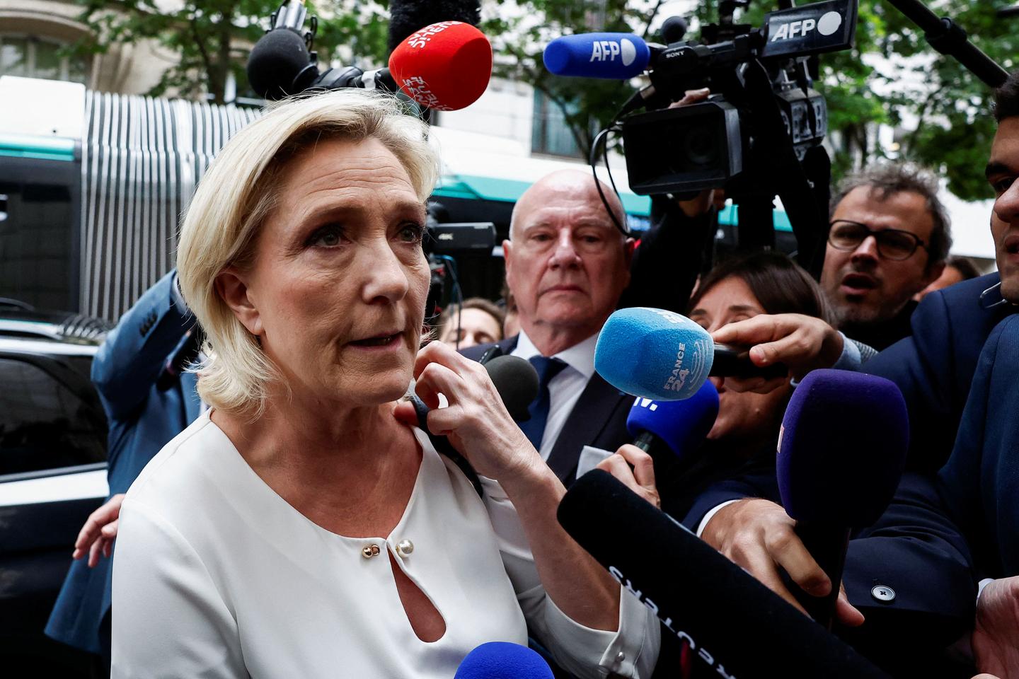 Le Pen accuses Macron of 'administrative coup d'état' as he speeds up appointments