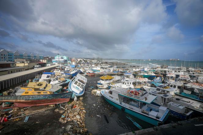 Hurricane Beryl strengthens to 'potentially catastrophic' Category 5 storm | WN24 9 Fishing vessels lie damaged after Hurricane Beryl passed through the Bridgetown Fisheries in Barbados, Monday, July 1, 2024. (AP Photo/Ricardo Mazalan)