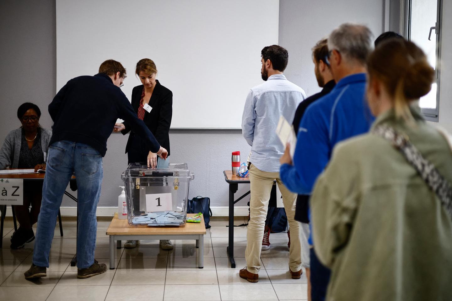 French elections: Left projected to win most seats, ahead of Macron's coalition and far right