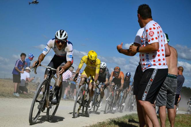 Remco Evenepoel, Tadej Pogacar and Jonas Vingegaard on a gravel sector during the 9th stage of the 111th edition of the Tour de France cycling race, 199km stage departing and finishing in Troyes, on July 7, 2024.