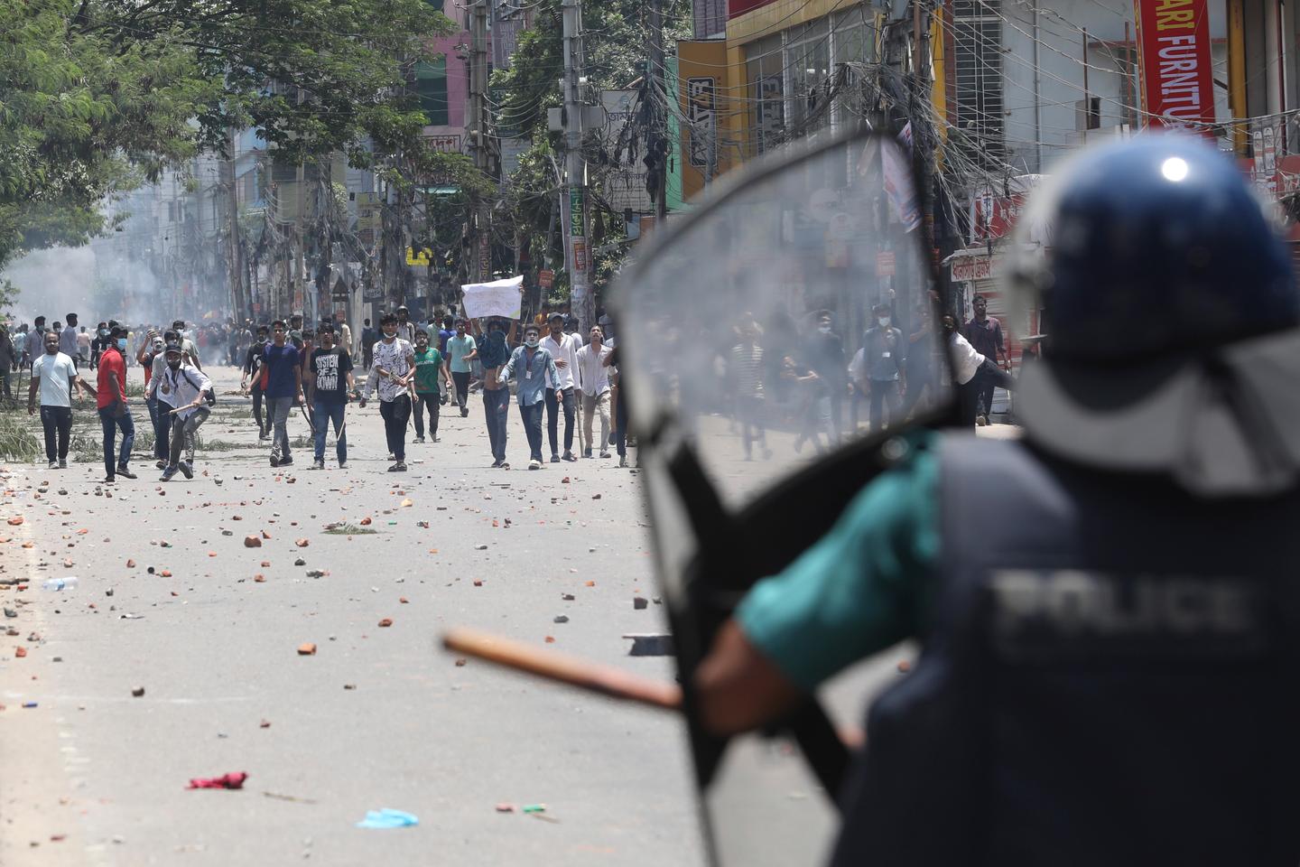 Bangladesh protesters set fire to state TV headquarters