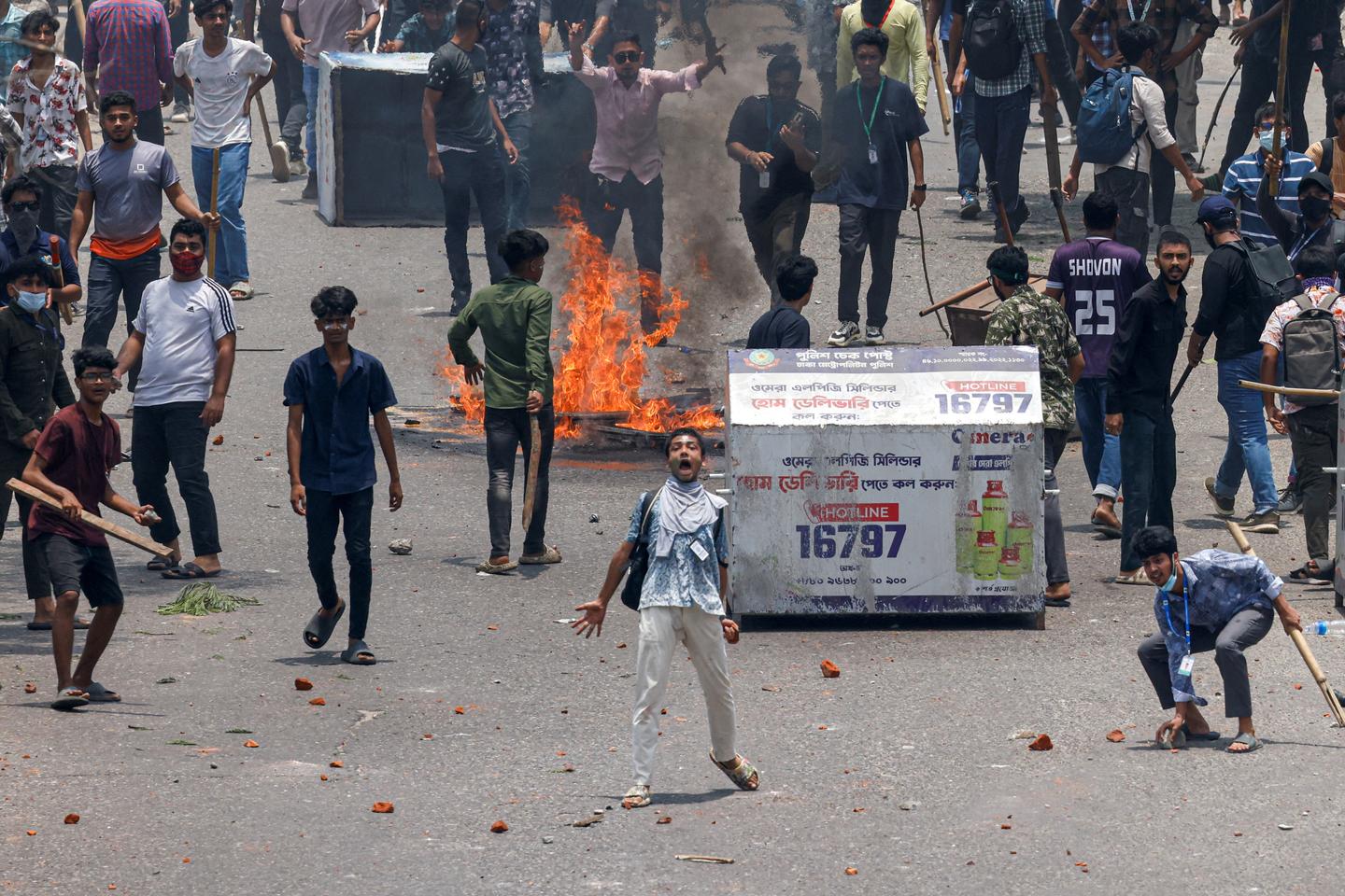 Protesters set fire to government buildings in Bangladesh