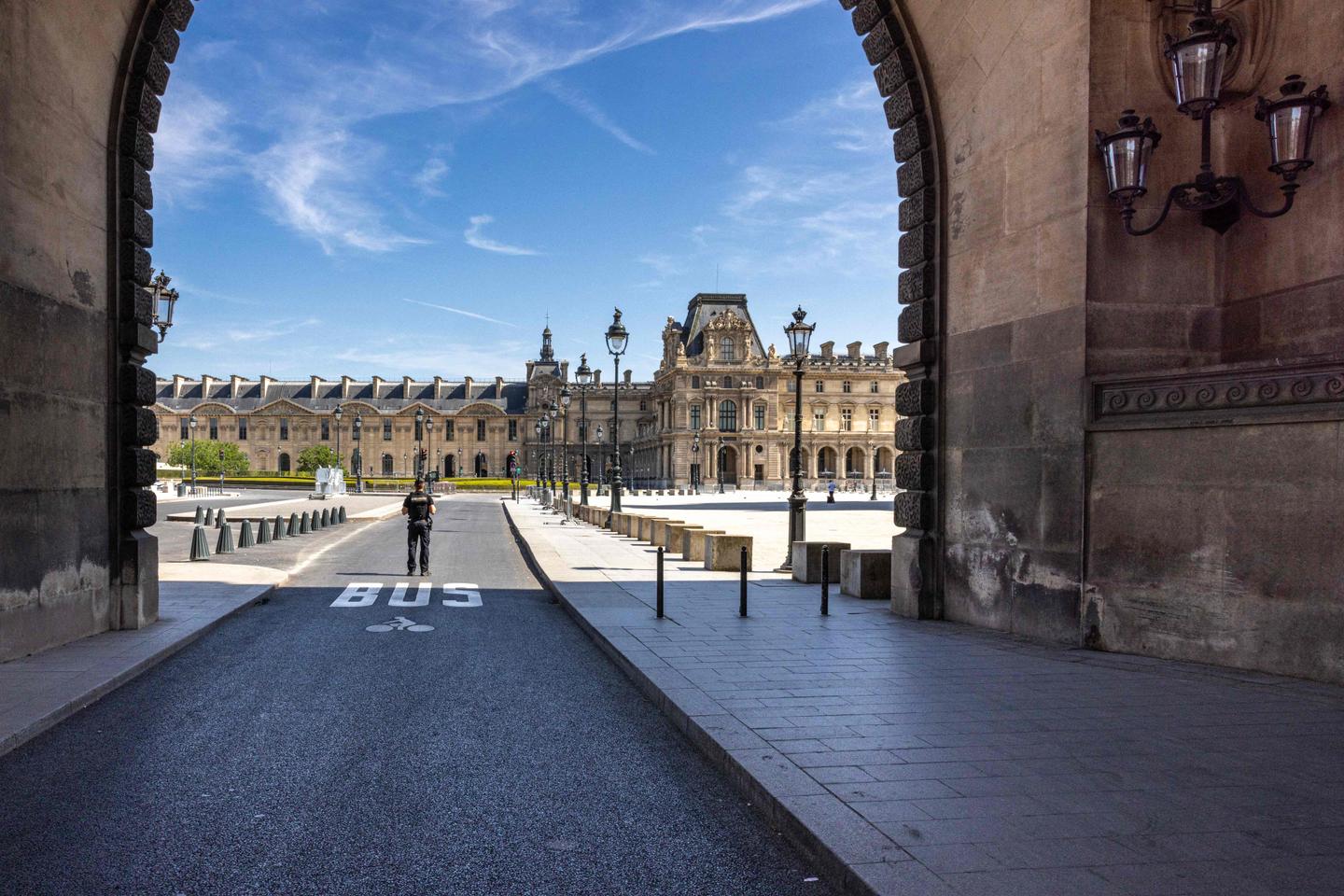 Central Paris locks down for Olympics as athletes arrive