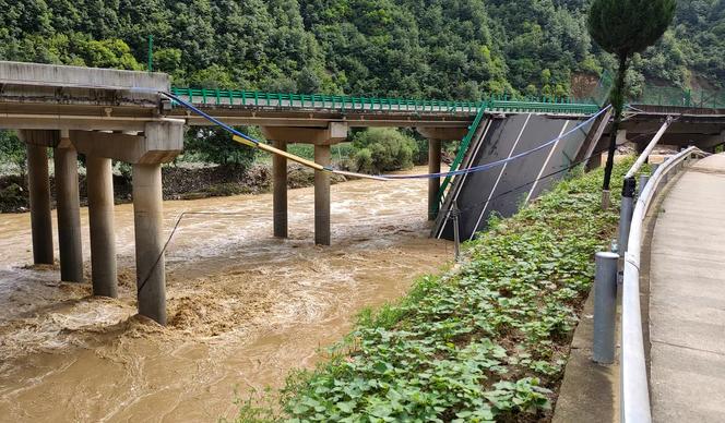 This photo released by Xinhua News Agency shows a collapsed bridge in Shangluo (Shaanxi Province, northwest China), on July 20, 2024.