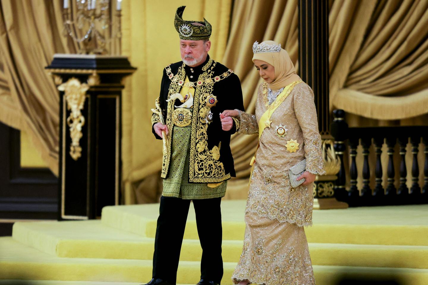 Malaysia honors a new king in coronation marked by pomp and cannon fire