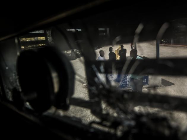 Le port de la capitale haïtienne, ici vu depuis un blindé de la police nationale, le 13 juillet 2024, est l’un des rares sites de Port-au-Prince à être sécurisé afin de garantir l’arrivée des marchandises.