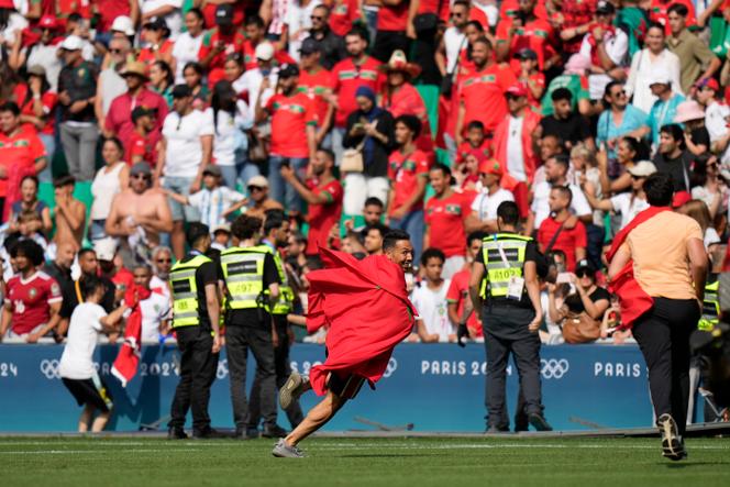 Morocco fans rush pitch during Olympic football opener vs Argentina, goal  overturned