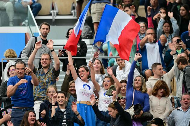 Fans of Caroline Garcia in the stands at Roland-Garros, during the tennis match between her and Romania's Jaqueline Adina Cristian during the Paris 2024 Games, July 27, 2024.