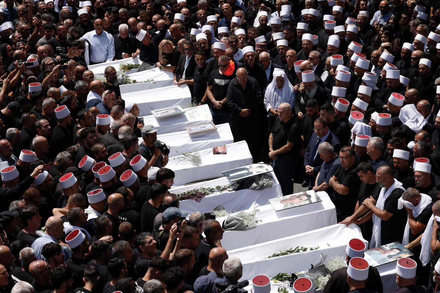 Thousands of Druze mourn youths killed in Golan rocket attack