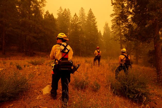 Firefighters have to battle over rough terrain as fire activity "builds up," warned operations chief Mark Brunton.