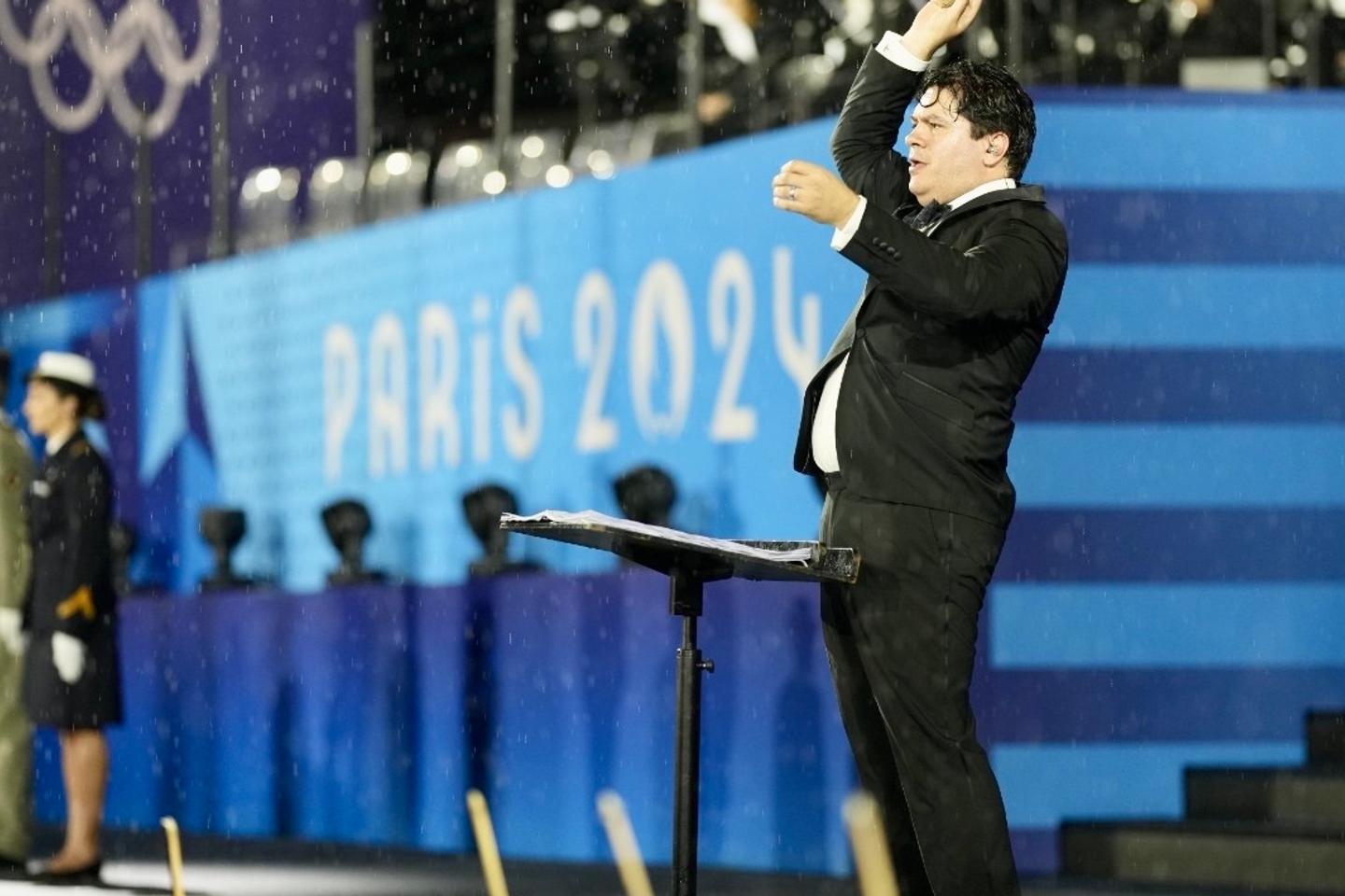 NextImg:Paris 2024: The opening ceremony's string instruments, under police escort and heavy rain