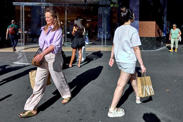Around Printemps and Galeries Lafayette, Paris, July 29, 2024.