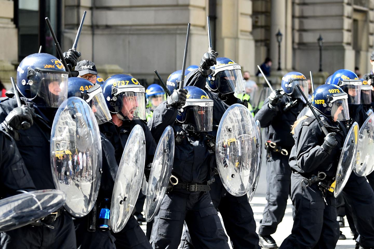 Far-right protesters clash with police as UK unrest spreads