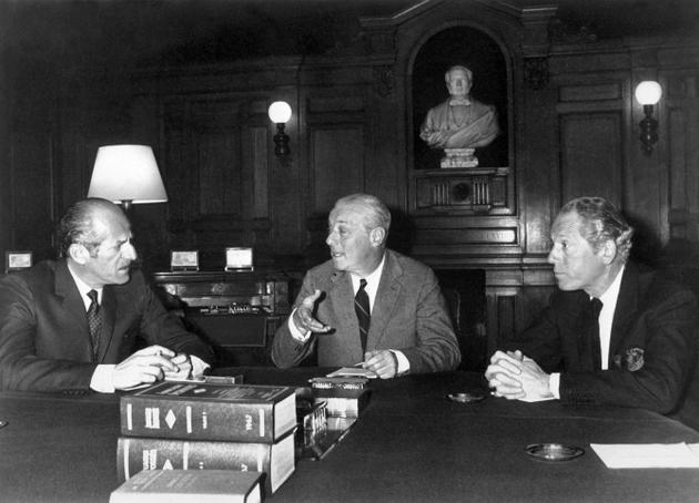Baron Guy de Rothschild surrounded by his cousins Barons Elie (right) and Alain, in the Rothschild bank office on Rue Laffitte in Paris, April 27, 1967.