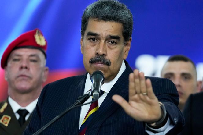 Venezuelan President Nicolás Maduro speaks to reporters Friday, Aug. 9, 2024, in Caracas, Venezuela.