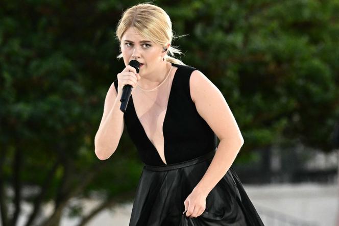 Singer Zaho de Sagazan performs “Sous le ciel de Paris” for the closing ceremony of the Olympic Games, in the Tuileries Gardens, in Paris, on August 11, 2024.
