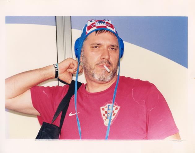 A Croatia fan at the water polo match between Italy and Croatia at the Saint-Denis Aquatic Center on July 30.