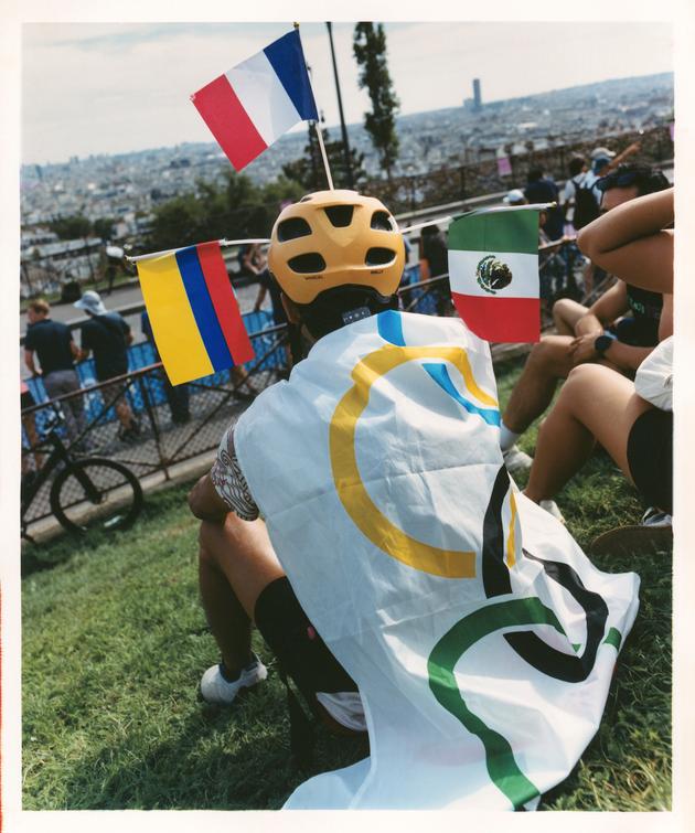 Gustavo, a spectator at the women's road race, at the foot of the Sacré-Coeur Basilica, Paris, August 4.