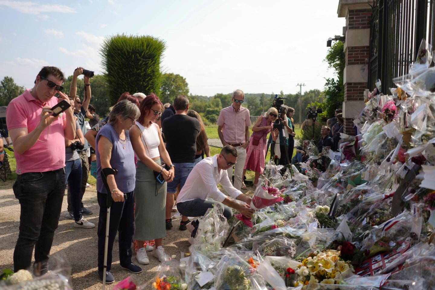 Film legend Alain Delon buried near his dogs in private funeral
