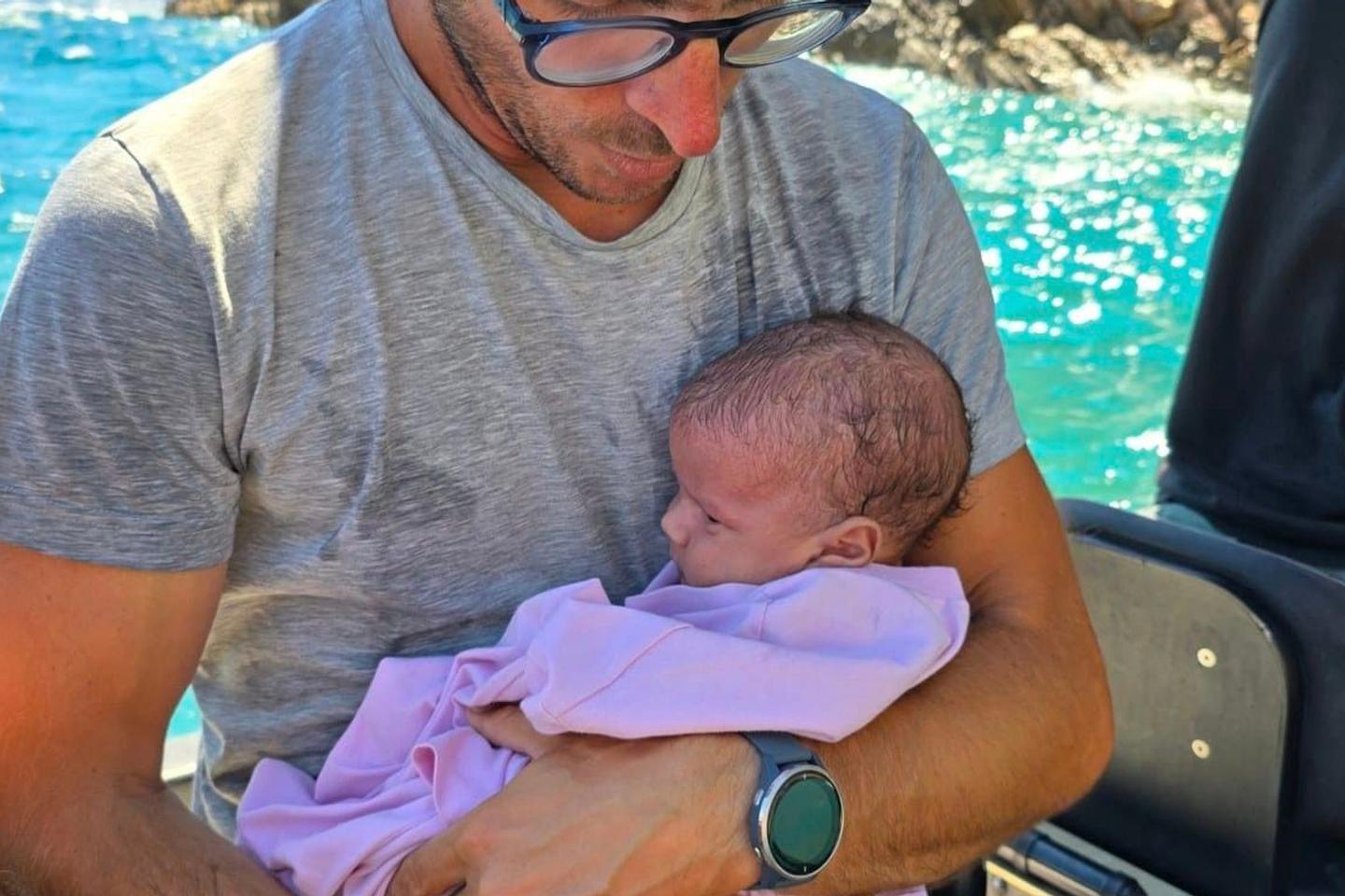 Rescue of refugee baby moves Greece