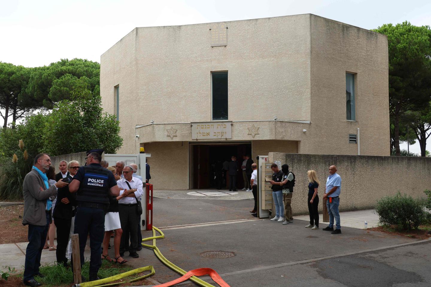 Two suspects charged after France synagogue attack