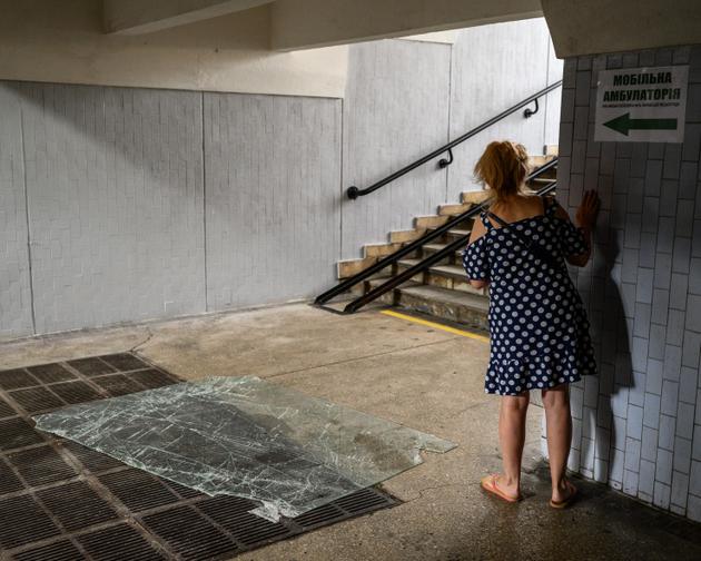 Exiting the metro at the foot of the bombed-out Chudho supermarket in Kharkiv (Ukraine), September 1, 2024.
