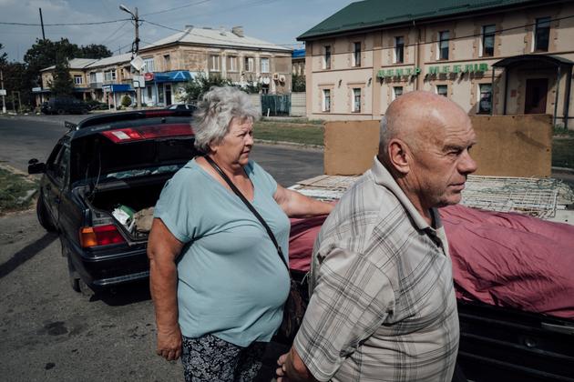 Alexei and his wife in Myrnohrad, on the front line east of Pokrovsk, Ukraine, September 1, 2024. They decided to flee to Mezhova, 60 kilometers away.
