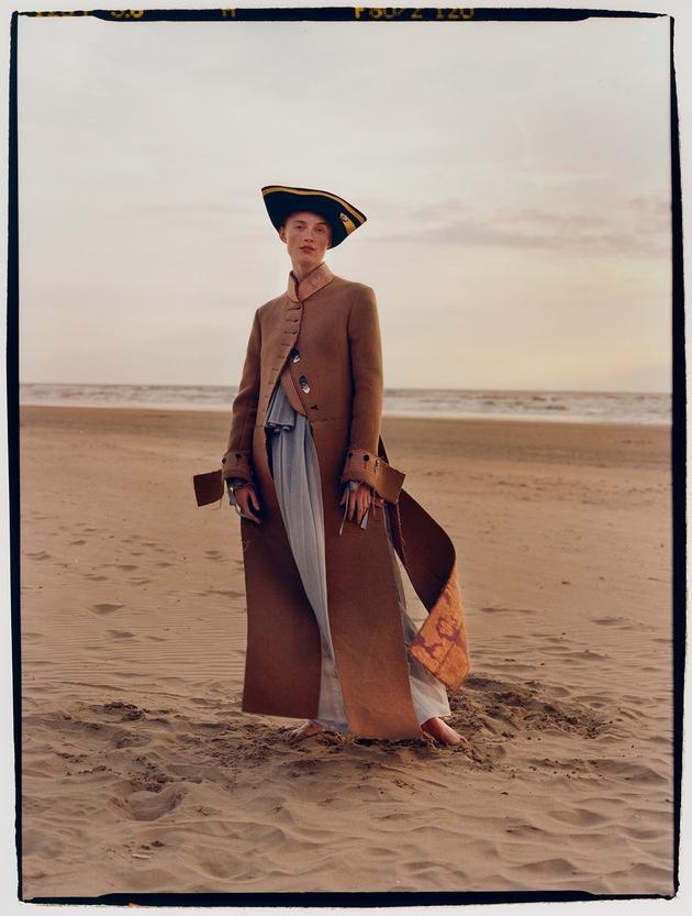 Wool coat and silk and cotton dress, Louis Vuitton. Vintage hat.