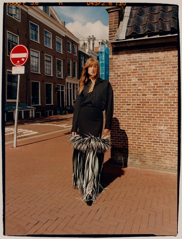Cotton shirt, cotton skirt with silk fringe, and leather shoes, Bottega Veneta.