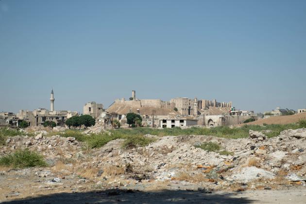 A wide view of Aleppo's citadel and destroyed old town, Syria, in the summer of 2024.