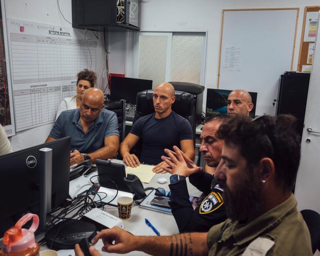 The mayor of Acre, Amichai Ben Shlush (center), at a crisis meeting following the intensification of clashes between Israel and Hezbollah, in the basement of his town hall, September 23, 2024.