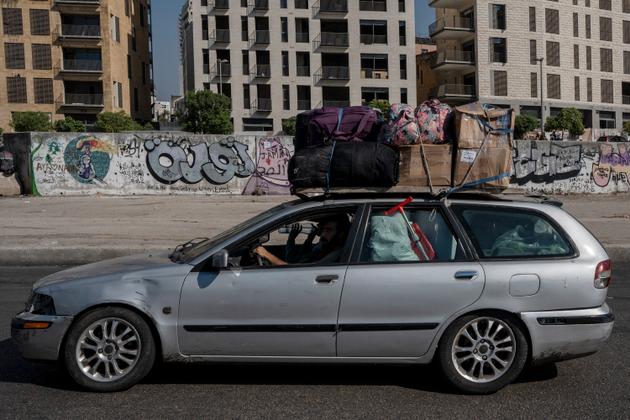 Une voiture de déplacés libanais, peu de temps après l’annonce de la mort de Hassan Nasrallah, place des Martyrs, à Beyrouth, le 28 septembre 2024.