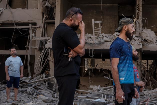 A man cries at the scene of an Israeli strike in Dahiyeh, Lebanon, September 29, 2024.