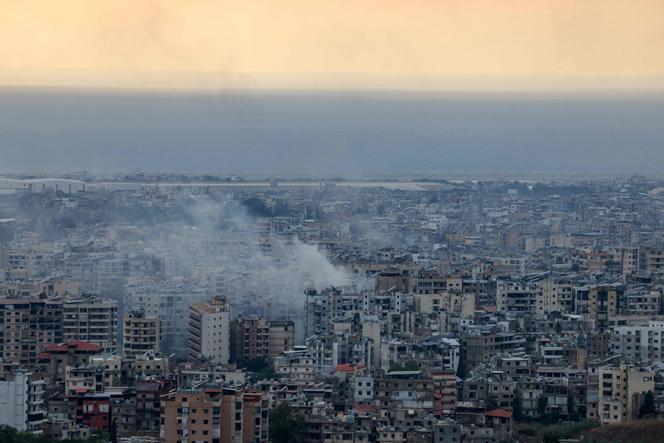 Smoke billows from the site of an Israeli air strike that targeted a neighborhood in Beirut's southern suburbs on October 6, 2024. Israel unleashed intense strikes targeting Hezbollah on October 6, almost a year since the attack by Palestinian Hamas militants that sparked the war in Gaza.
