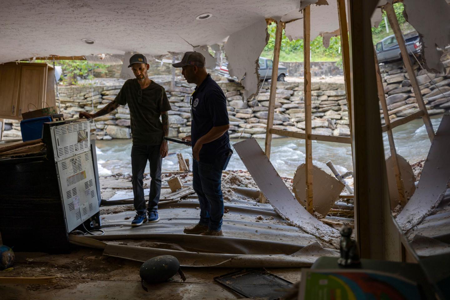 Militia threat in North Carolina force hurricane relief teams to change help tactics
