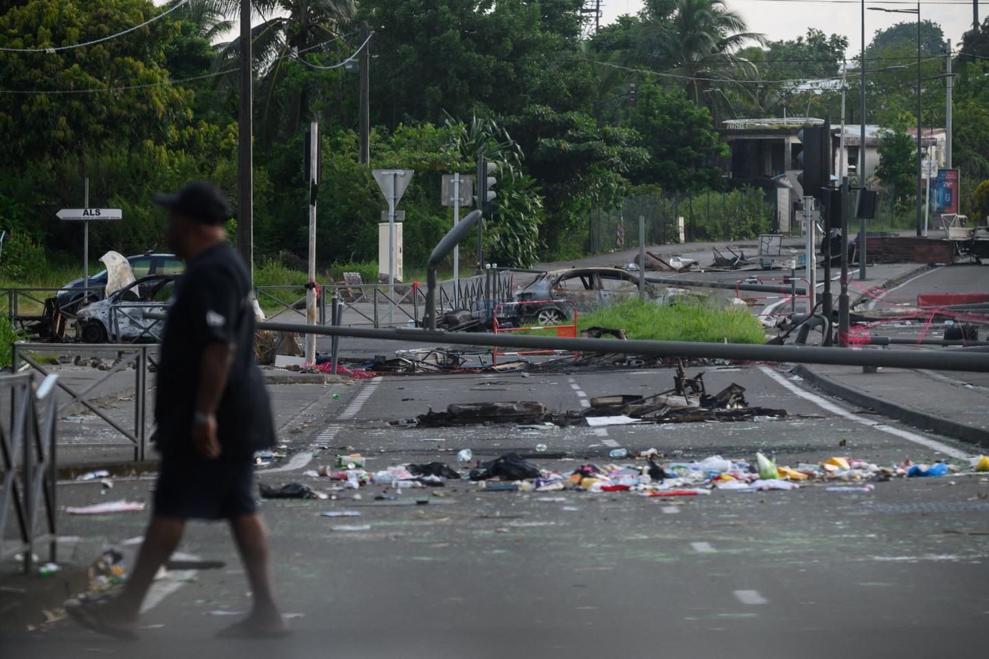 Protests banned in French island Martinique and curfew declared after riots