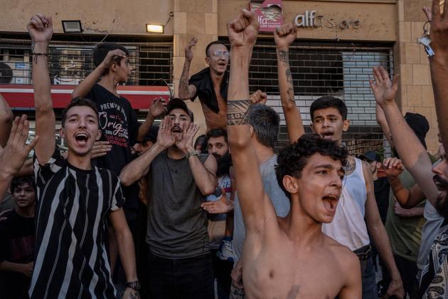 Martyrs' Square, Beirut, September 28. "This stunning photo of joy has an unexpected story. When Hassan Nasrallah's death was announced, the Lebanese street was in shock. I was standing silently in Martyrs' Square at the time, when I heard loud cheers from the surrounding cafés. The TV screen had broadcast an archive speech by Hassan Nasrallah, but with the 'live' banner, which misled the people in that café into thinking that the Hezbollah leader wasn't dead."