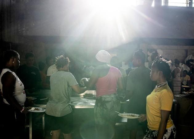 Food distribution in a warehouse housing around 150 women, mainly from Sierra Leone, in Hazmieh, south of Beirut, on October 15, 2024.