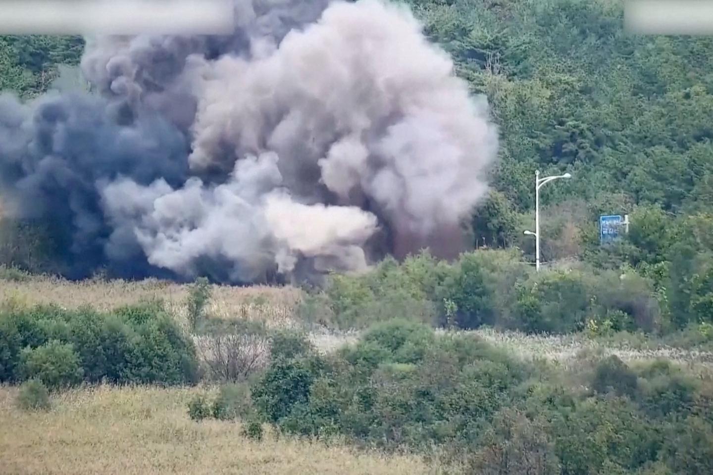 North Korea blows up roads, rails to South