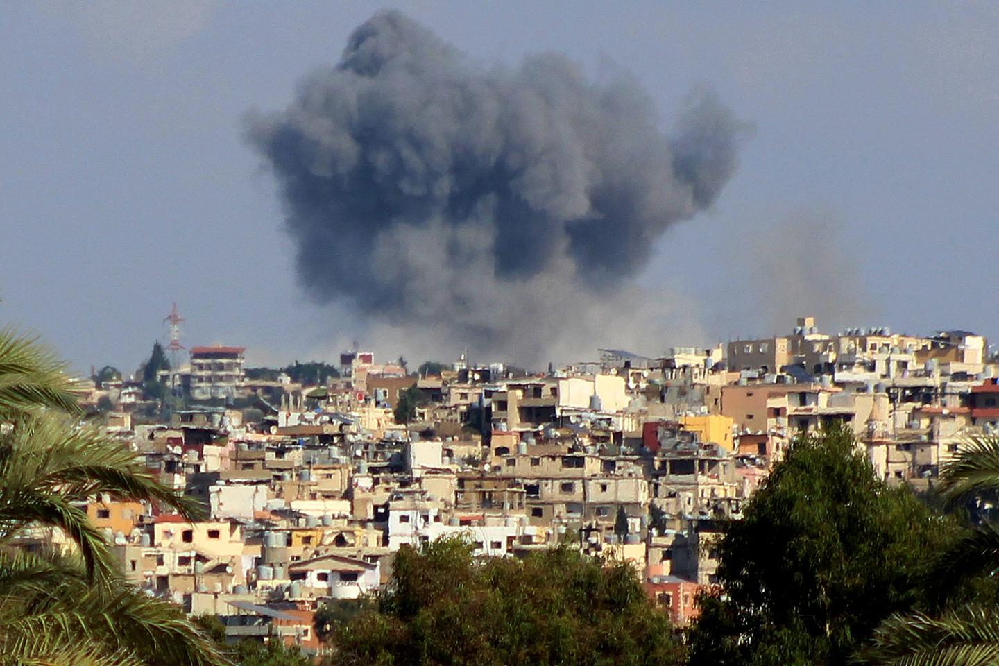 Israel carries out dozens of strikes on Hezbollah targets in Lebanon