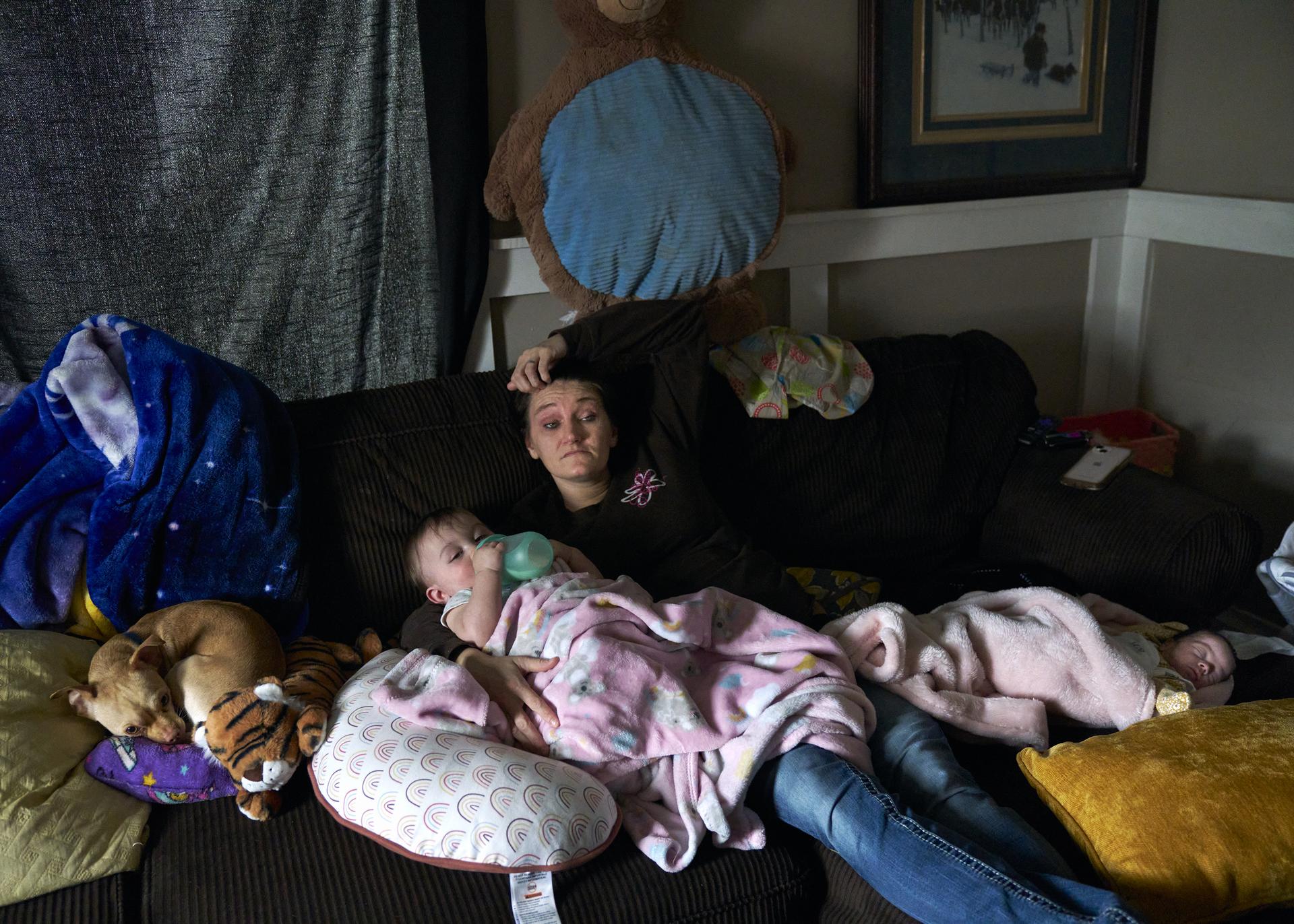 Mayron York Hollis with daughters Zoey and Elayna, at home in Clarksville, Tennessee, February 24, 2023.